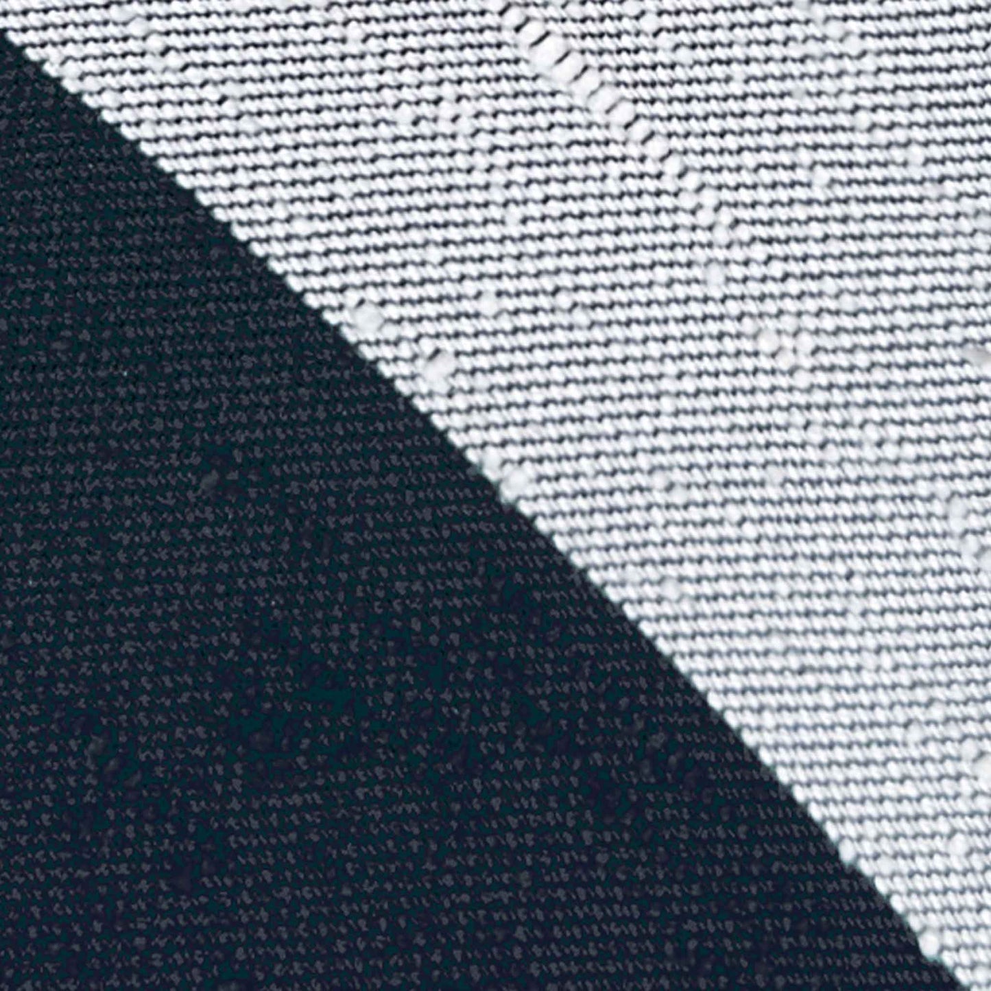Detail of shantung silk tie navy blue ivory textured slub fabric