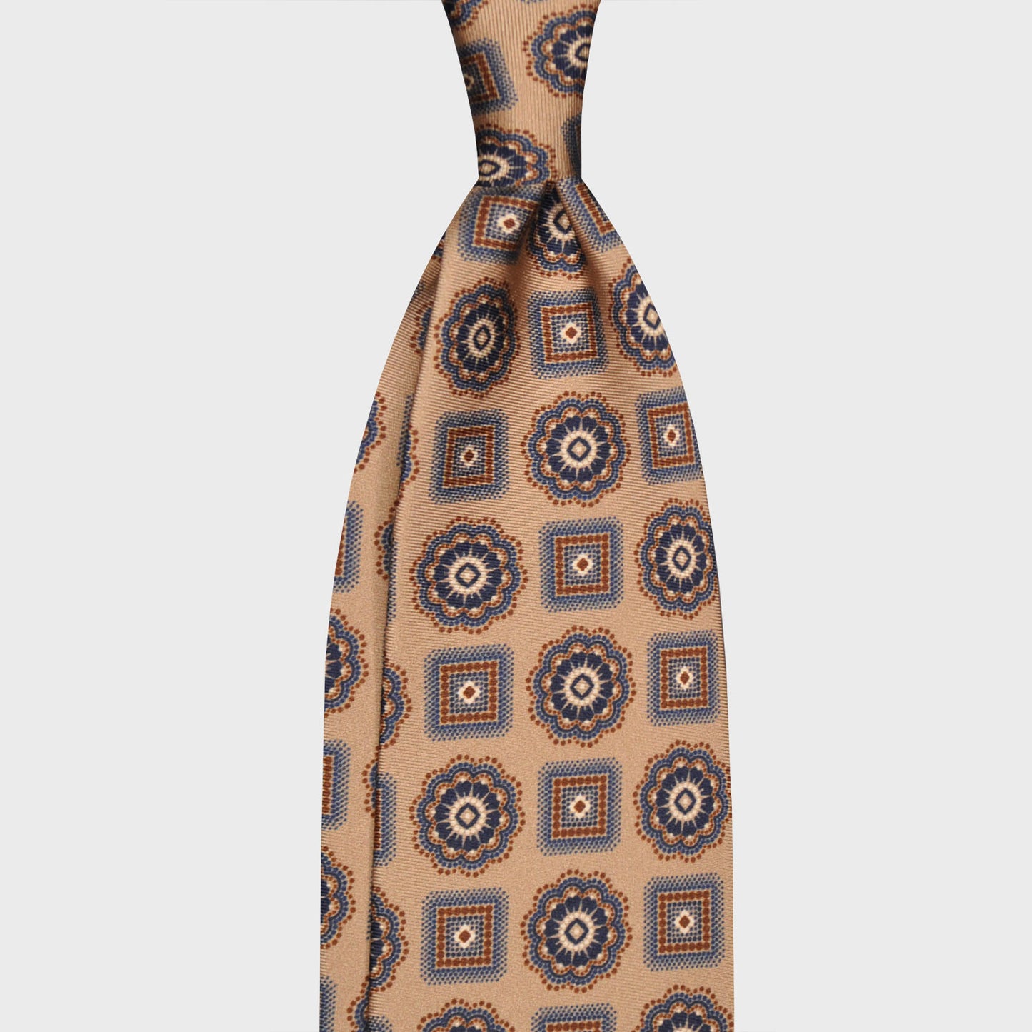 F.Marino Napoli classic silk tie exclusive for Wools Boutique Uomo hand rolled edge, unlined tie, cookie beige color with navy blue medallions pattern.